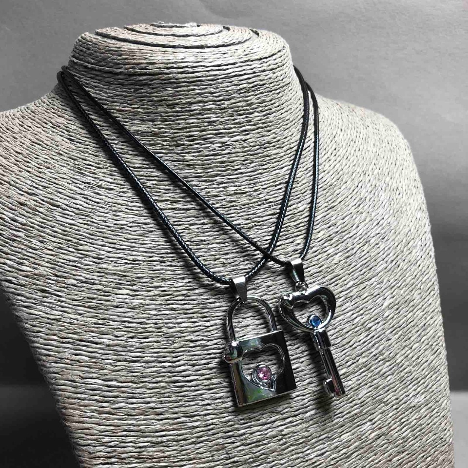 Pair Pendants 'Key and Lock', silver-tone metal, blue and pink rhinestones, 45x30 mm + -, length 45-50 cm