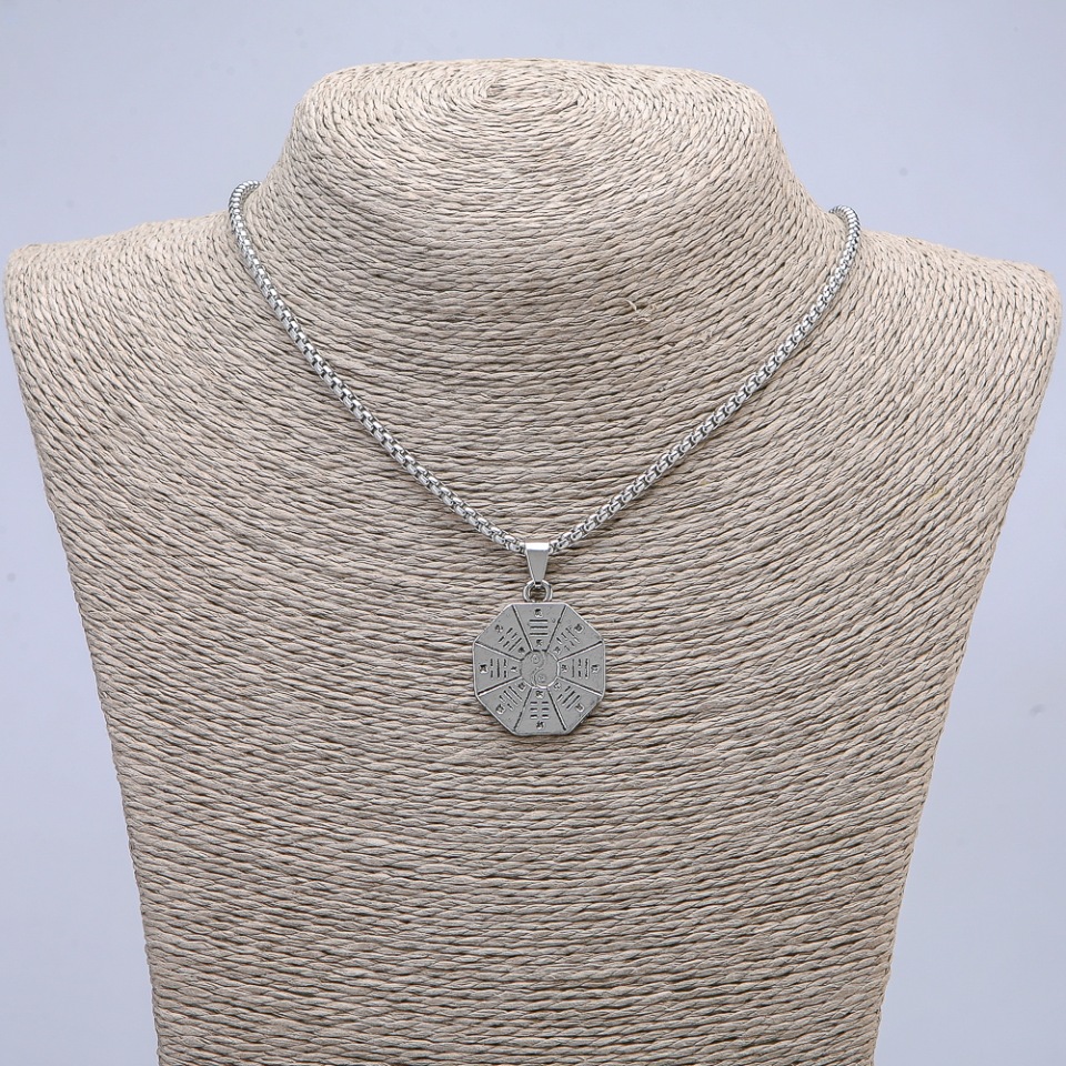 Pendant 'Yin Yang' 36x25 mm on a chain, length 70 cm + - silver-toned metal