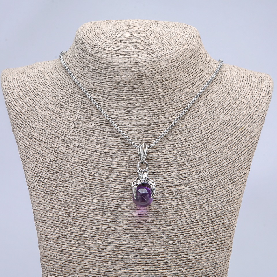 Pendant 'Paw with Ball' purple 45x15 mm + - on chain, length 70 cm + - silver-tone metal