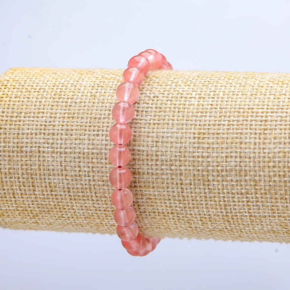 Elastic bracelet with synthetic chalcedony beads, smooth round, 6 mm diameter, 18 cm length