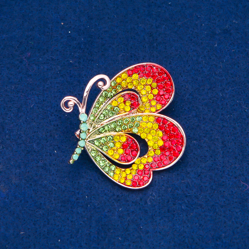 Brooch 'Butterflies' with golden metal, green, yellow and red crystals, 43x43mm +