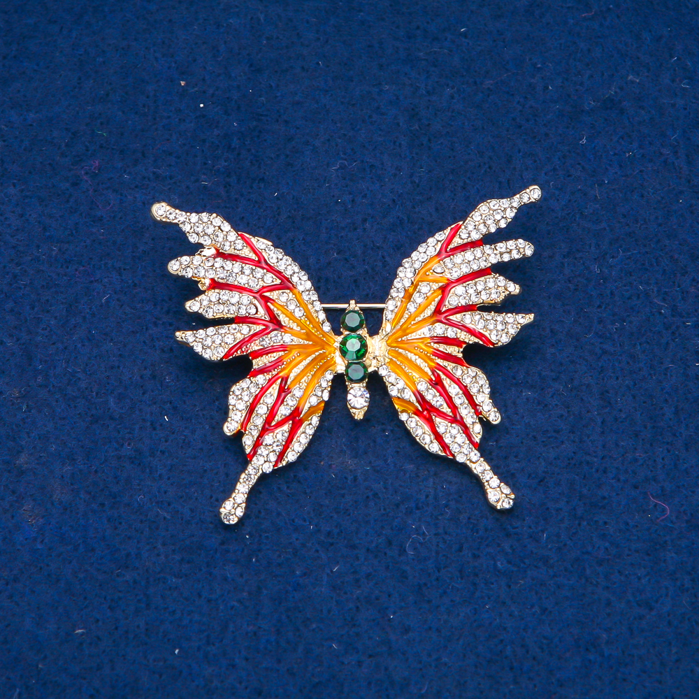 Butterfly Brooch, gold-toned metal, enamel, and white and green crystals, 42×50 mm +