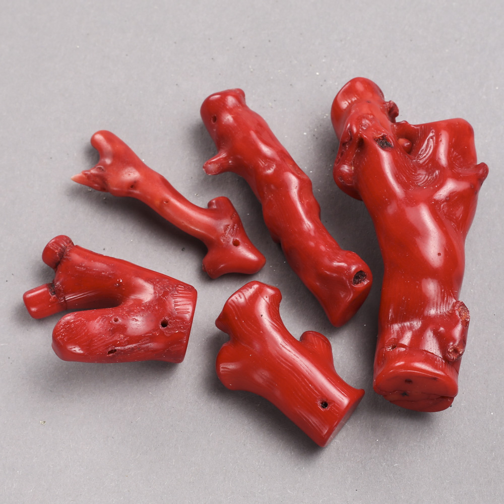 Natural Red Coral with hole 45×15 mm – assorted sizes (1 piece)