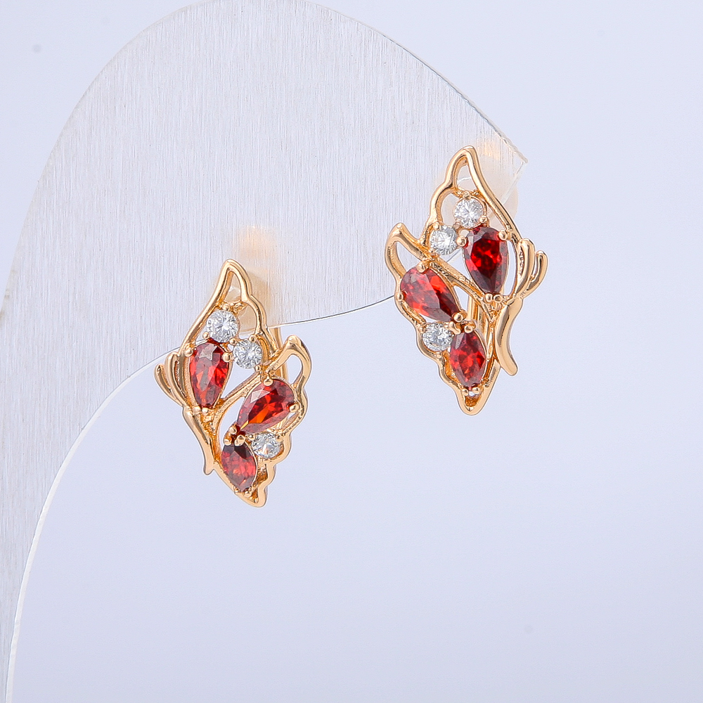 Xuping Earrings with 18K Gold Plating, White Rhinestones and Red Crystals, Diameter 18x12mm +