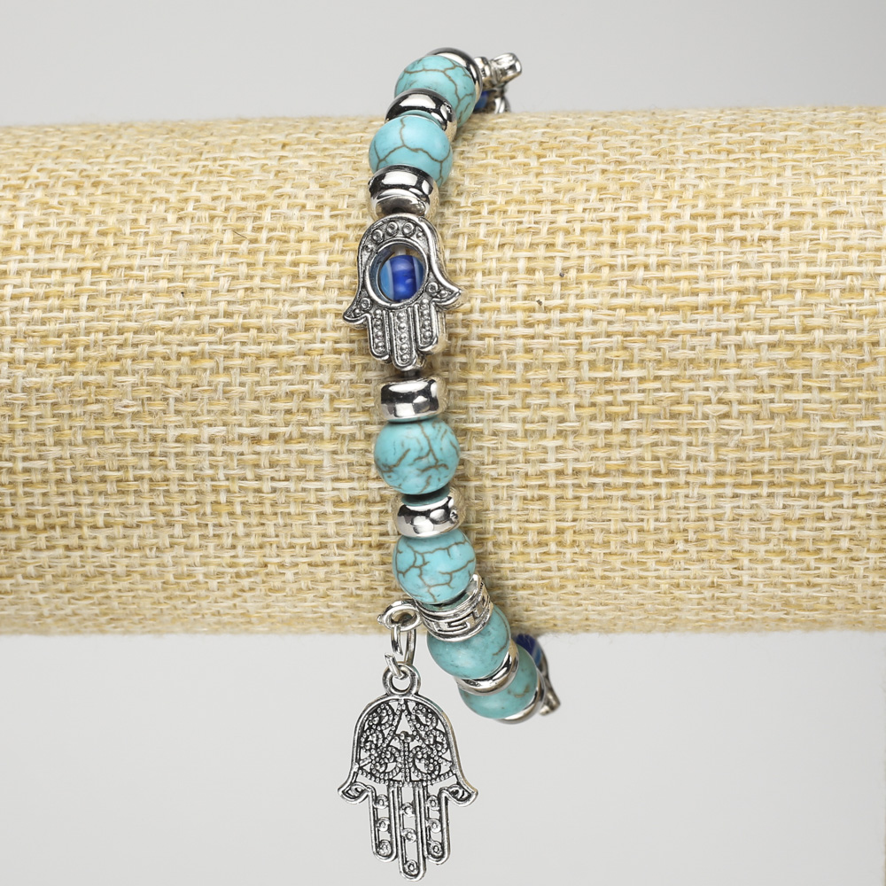Turquoise Bead Bracelet on Elastic, about 8 mm in diameter, with silver palm-shaped inserts and pendants, length 18 cm+