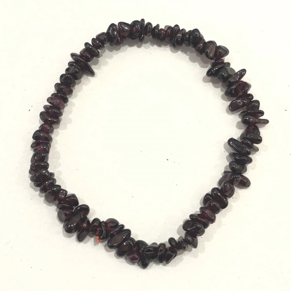 Bracelet with natural garnet chips, 5± mm in diameter, on an elastic cord, 18 cm long