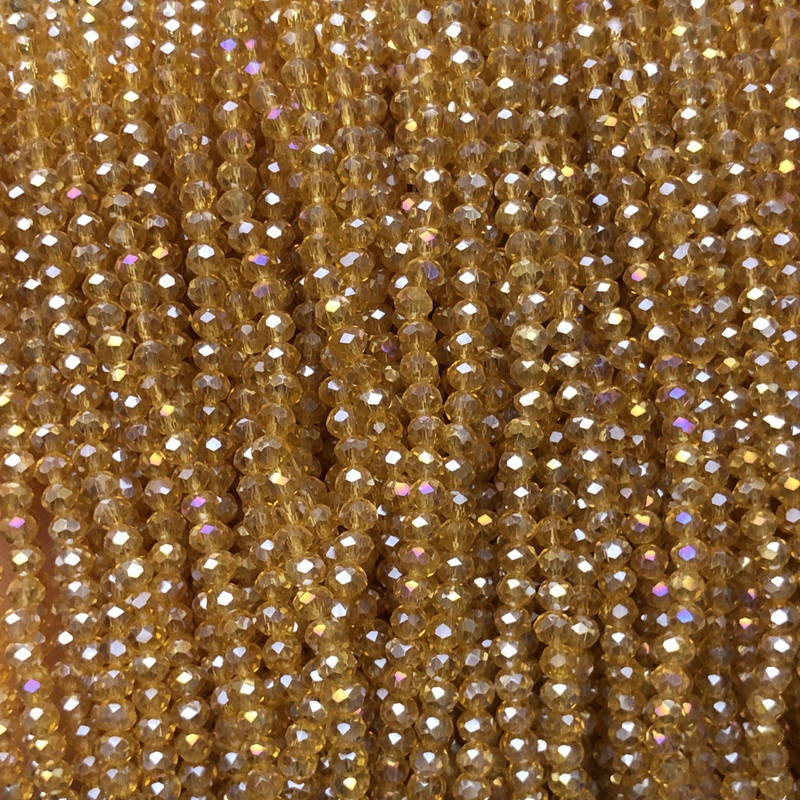 Beads Czech Crystal on a thread orange-peach transparent with gasoline sheen, faceted rondel, diameter 3.5x3 mm, length 36-38 cm
