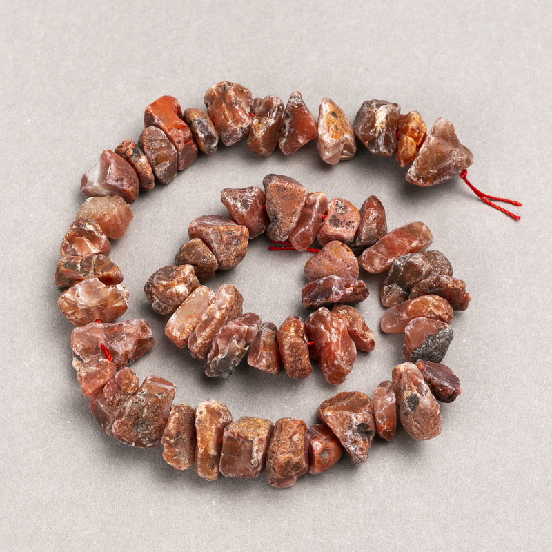 Beads on a thread - raw Red Jasper, faceted, diameter 13x8 mm (±), length 41 cm