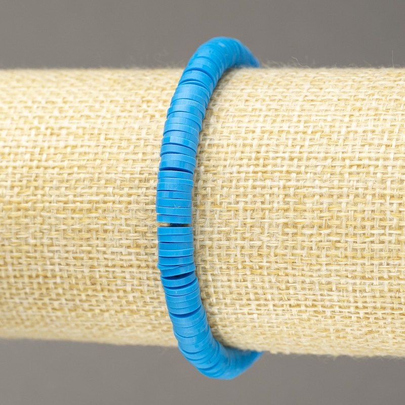 Браслет на гумці намистини круглі плоскі з полімерної глини синій