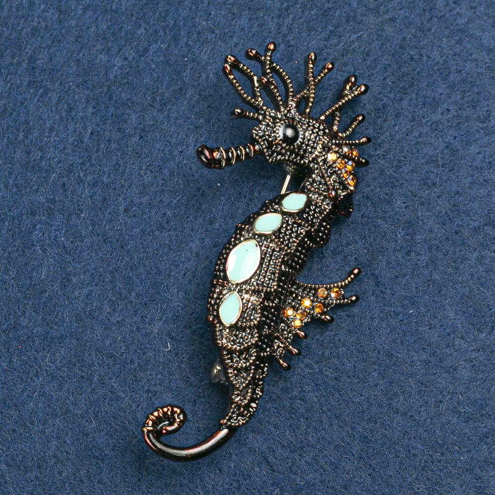 Brooch 'Sea Seahorse' with golden metal, turquoise enamel and golden benzine rhinestones 47×15 mm +
