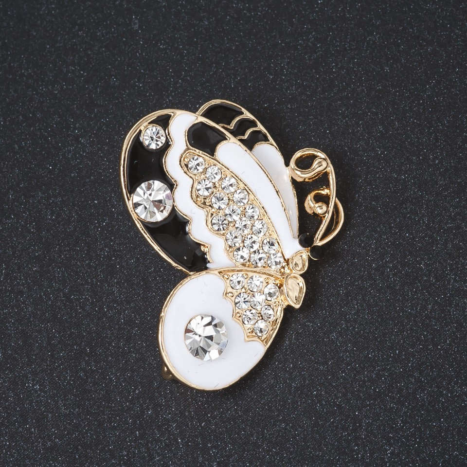 Brooch 'Butterfly' black and white enamel, crystals, metal color 'gold' 3.8 cm