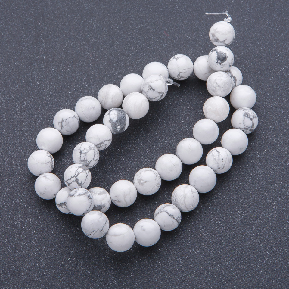 Howlite natural stone beads on a cord, round, 10mm diameter, 39 cm length