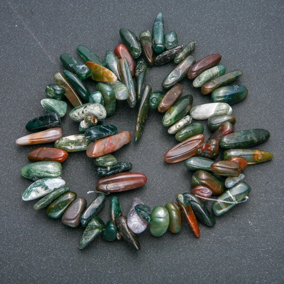 Bead strand of natural green jasper