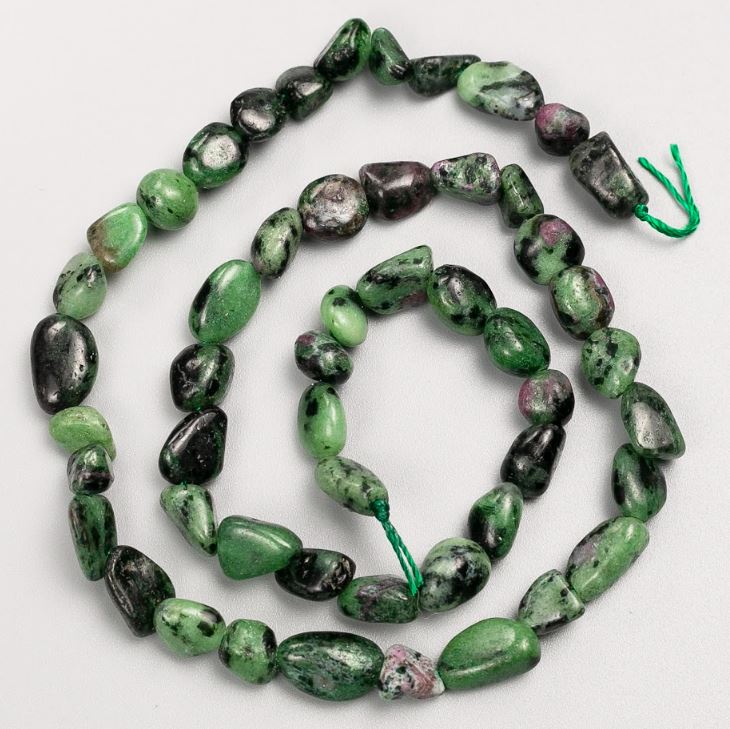 Beads on a thread of natural zoisite, tumbled, 7×9 mm, length 39 cm+-