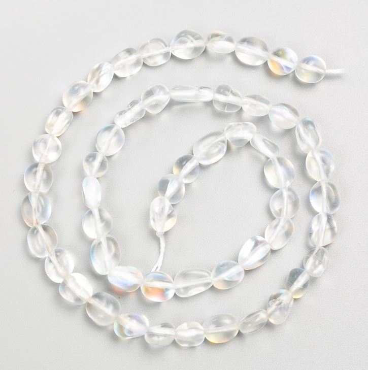 Намистини на нитці Опалове скло галтовка d 6х7мм+-, довжина 40см+