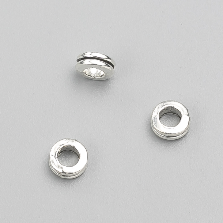 Bead insert findings, diameter 6x3 mm, 50 pcs ±, metal color 'silver'