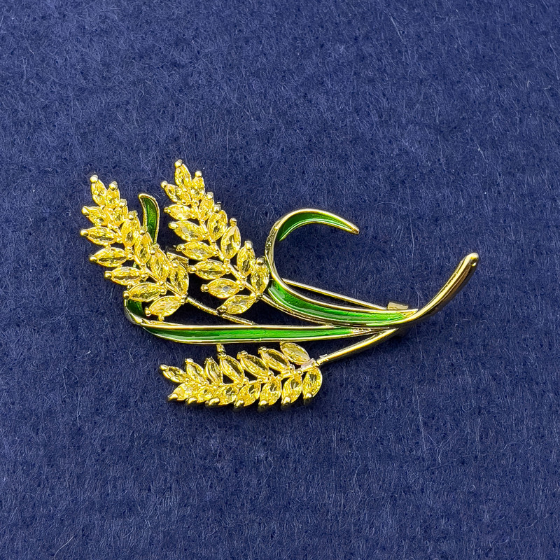 Brooch 'Wheat Ears' with yellow crystals, green enamel, gold-tone metal, diameter 56x35 mm+
