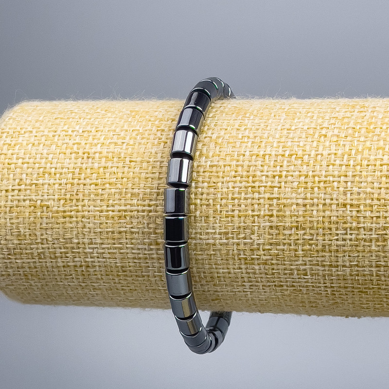 Hematite bracelet with cylindrical beads, diameter 6×6 mm ±, length 18 cm (stretch)