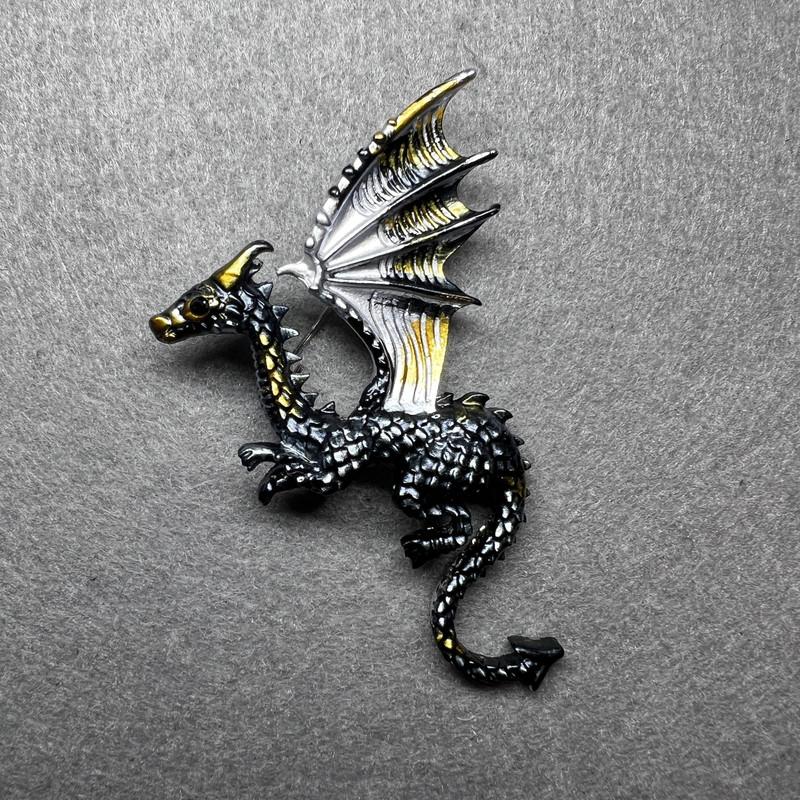 Dragon Brooch in matte gray with yellow and white enamel on silver metal, 42×66 mm