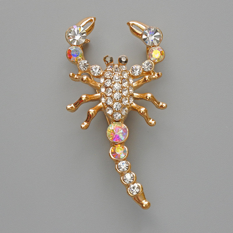 Brooch-pendant Scorpio with white crystals and chameleon crystals, gold-tone metal 28x54 mm